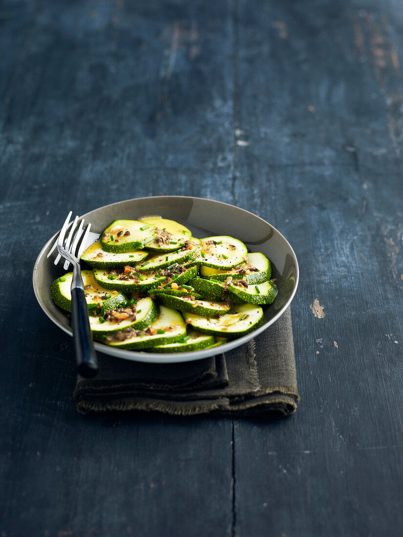 Zucchinis with anchovy and olive vinaigrette