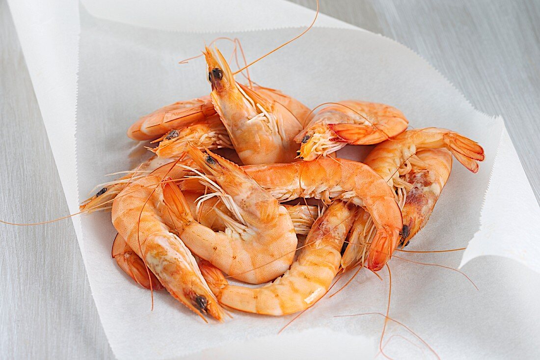 Fresh shrimps on a sheet of wax paper