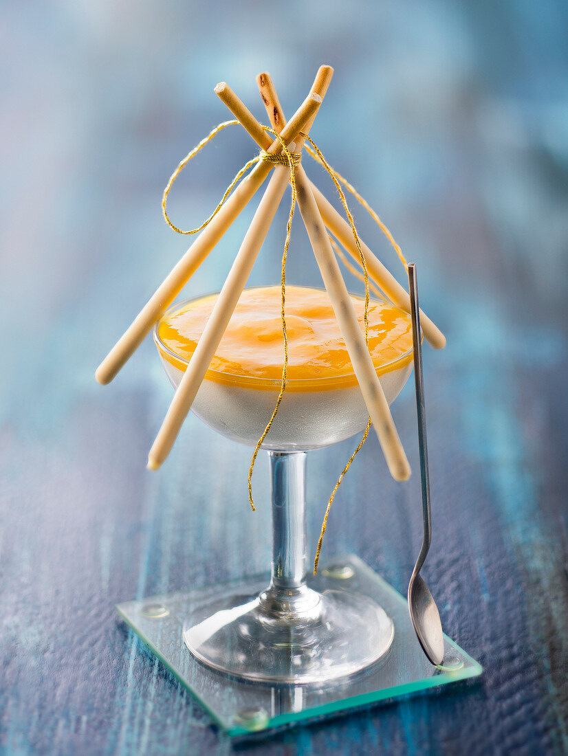 Pineapple-coconut mousses with white chocolate Mikados