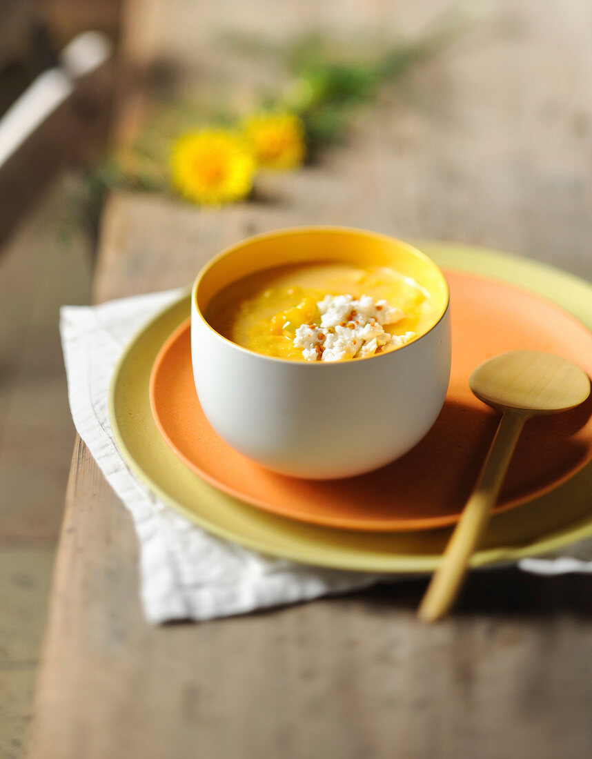 Yellow gazpacho with crumbled feta