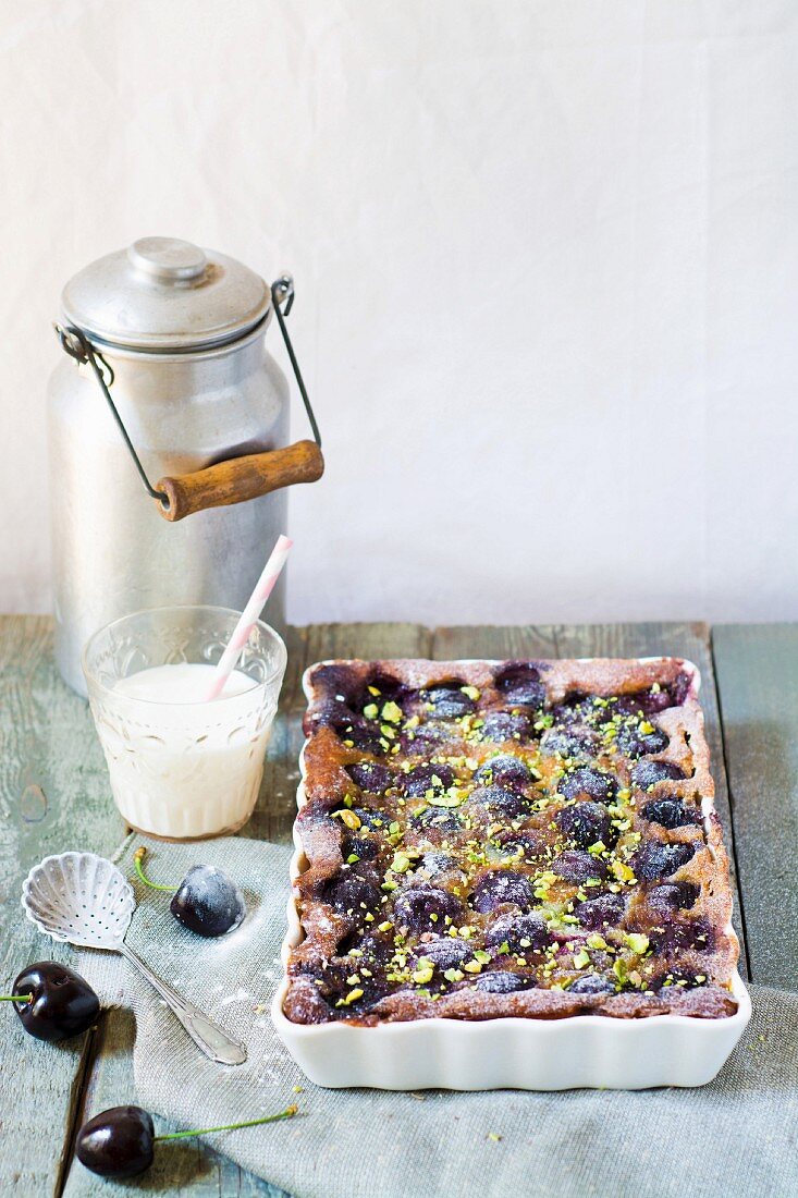 Cherry and crushed pistachio batter pudding