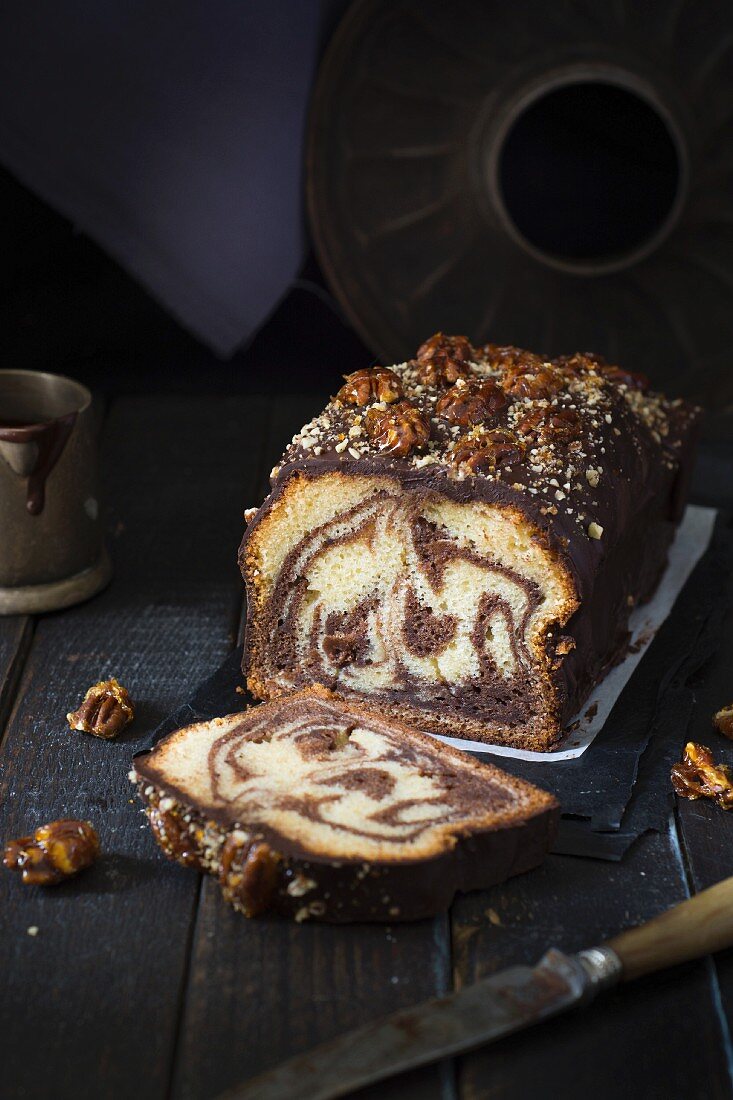 Chocolate marble cake topped with caramelized walnuts