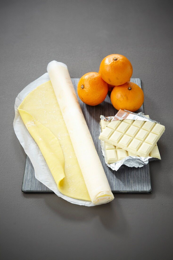Ingredients for a confit mandarin and white chocolate pie