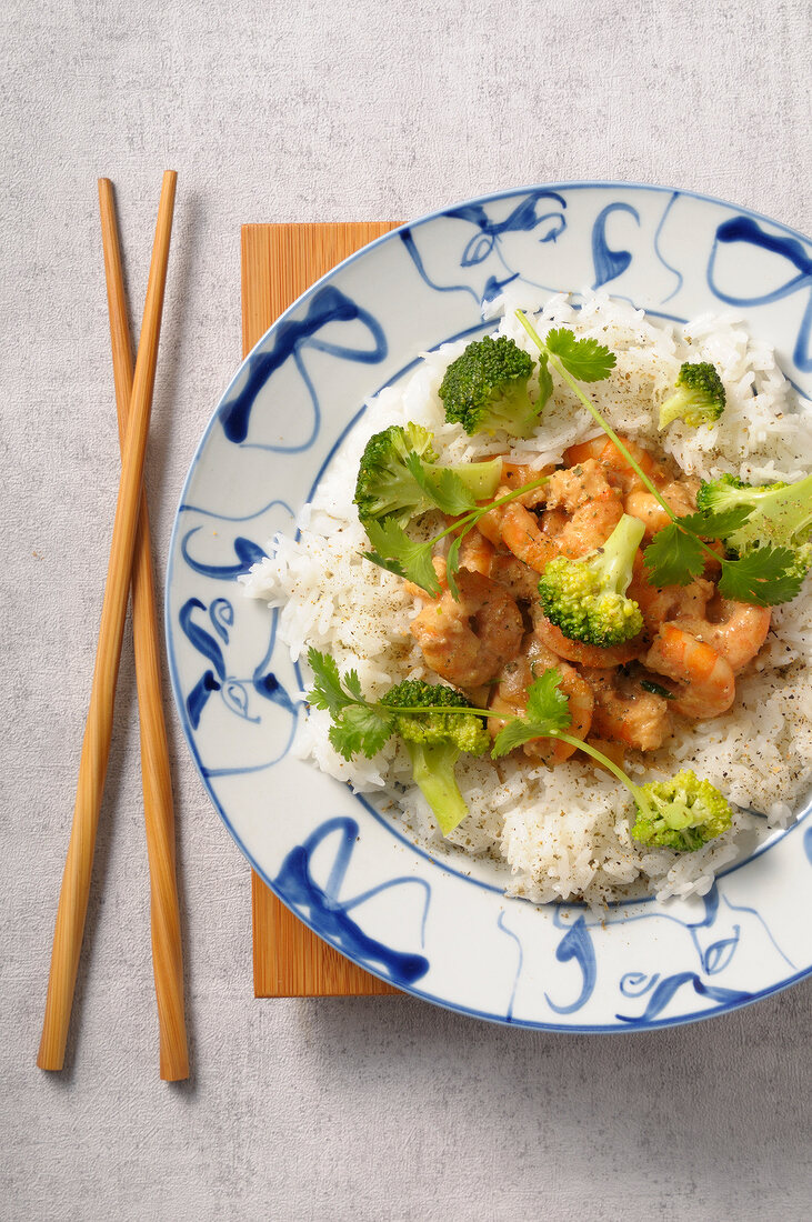 Rice with coconut milk shrimps and broccolis