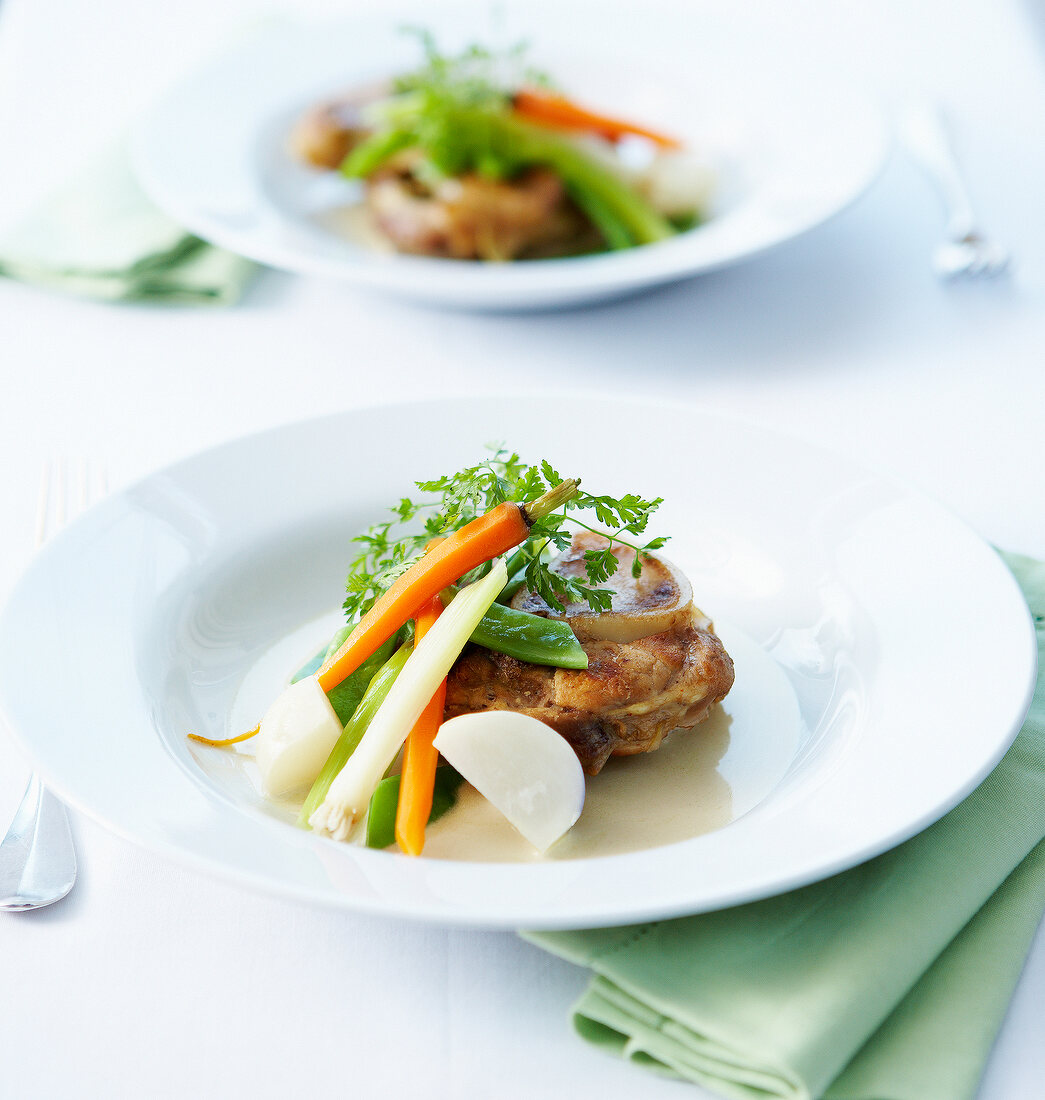 Osso bucco with steamed spring vegetables