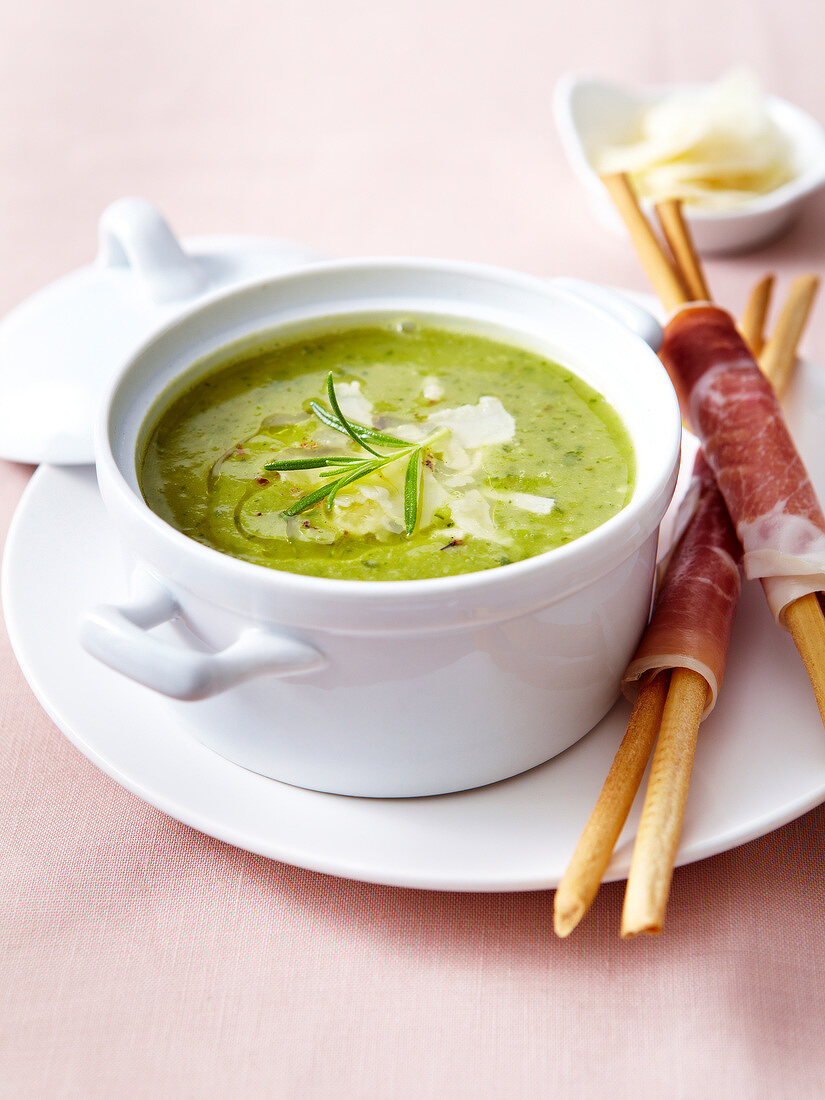 Creamed zucchini soup with rosemary and parmesan flakes,breadsticks wrapped in raw ham