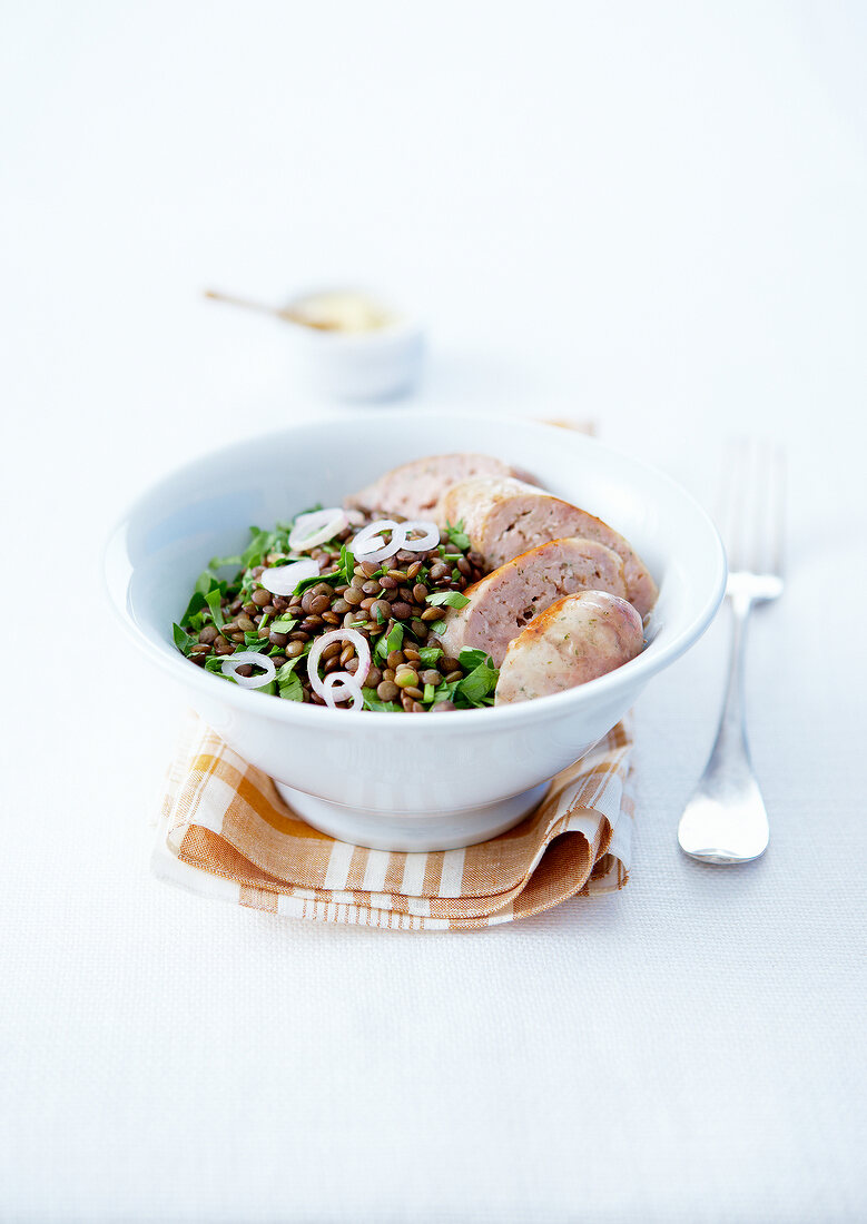Lentil salad with herbs and sausage from Toulouse
