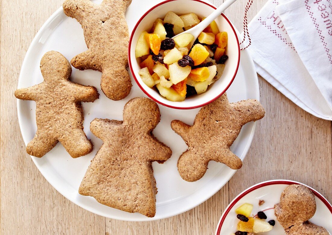Gingerbread men with stewed diced apples,pears and apricots