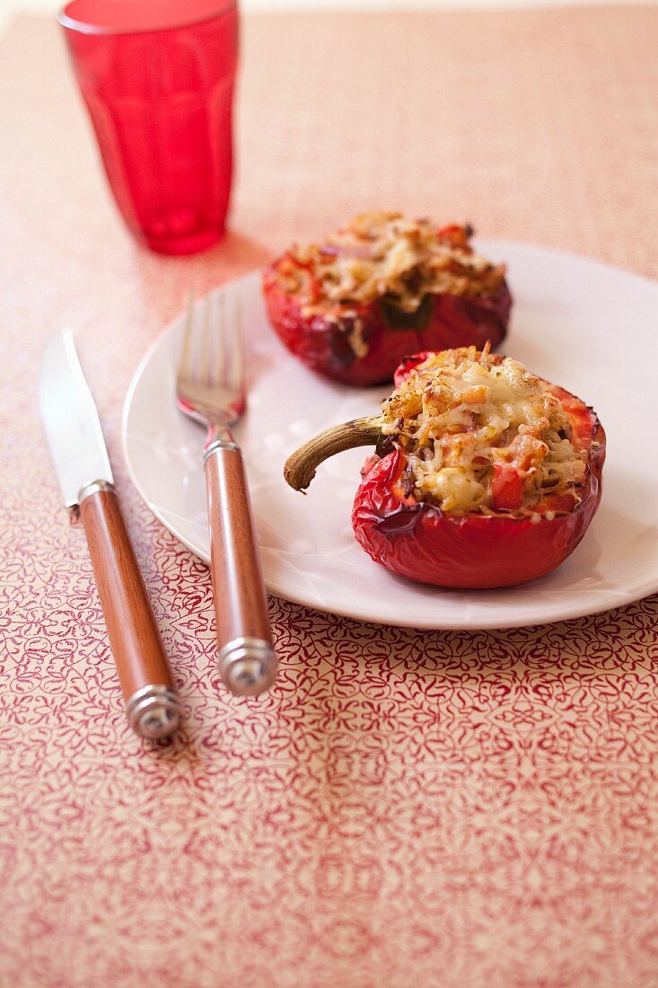 Red bell peppers stuffed with rice