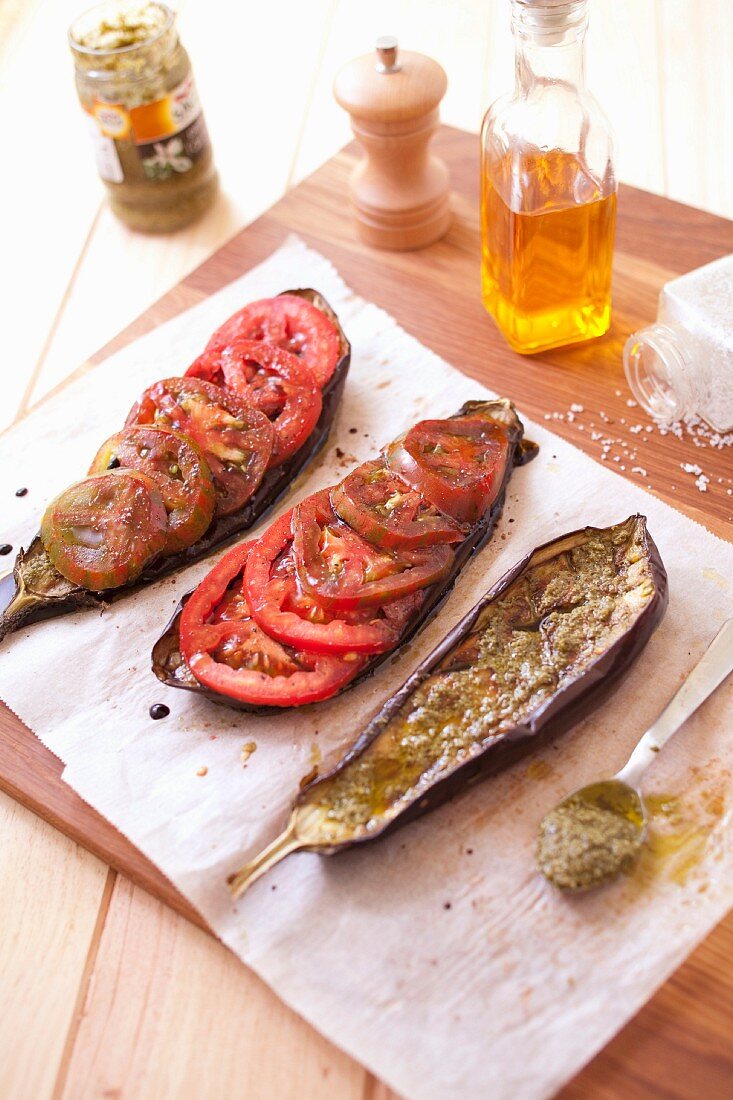 Grilled eggplants with pesto and tomatoes