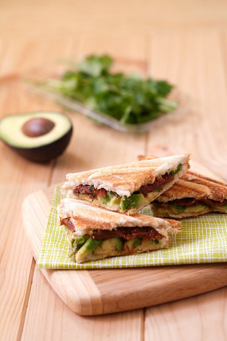 Avocado and sun-dried tomato toasted sandwich