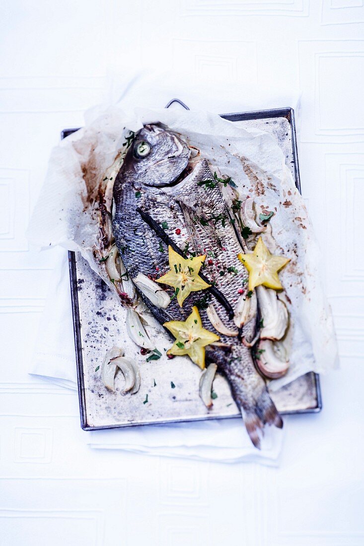 Baked sea bream with vanilla and star fruit