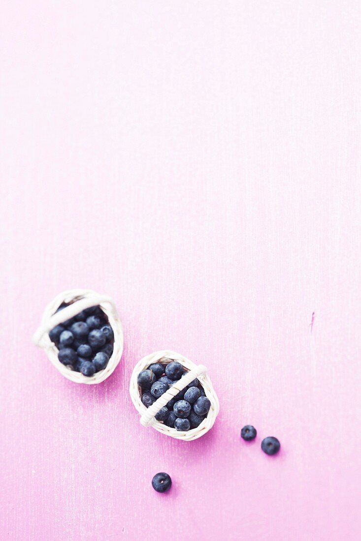 Small baskets of blueberries