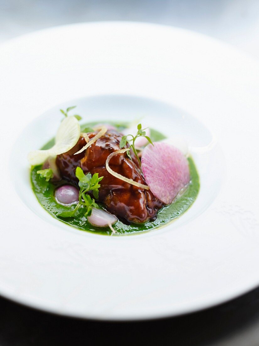 Veal sweetbreads, young turnips and lemon peel on parsley purée