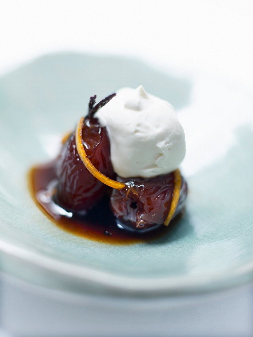 Marinated dates with coffee and orange and a scoop of vanilla ice cream