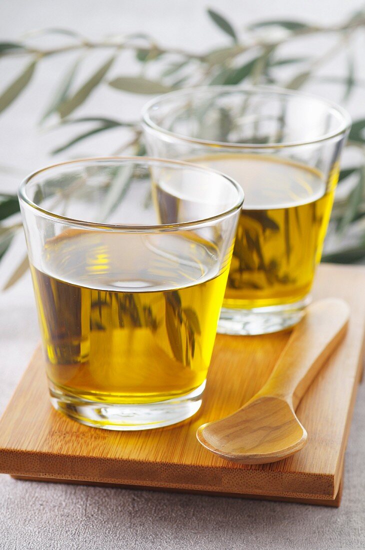 Glasses of olive oil