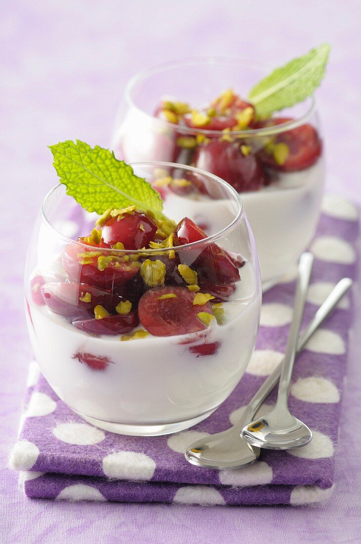 Yoghurt with cherries and pistachios