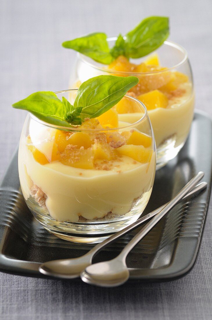 Mango,basil and cardamom cream desserts