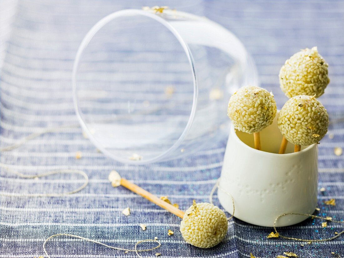 Matcha tea balls coated in sesame seeds breadstick pops