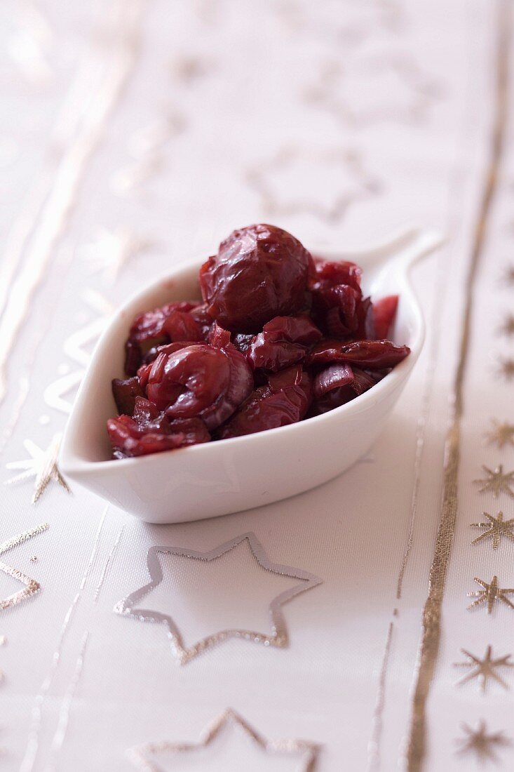 Small bowl of griotte sour cherry-orange sauce