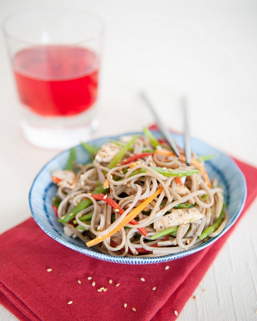 Sauteed noodles with thinly sliced vegetables and tofu