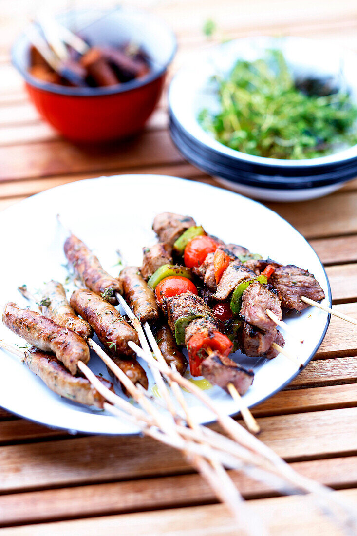 Beef skewers and mini grilled sausages