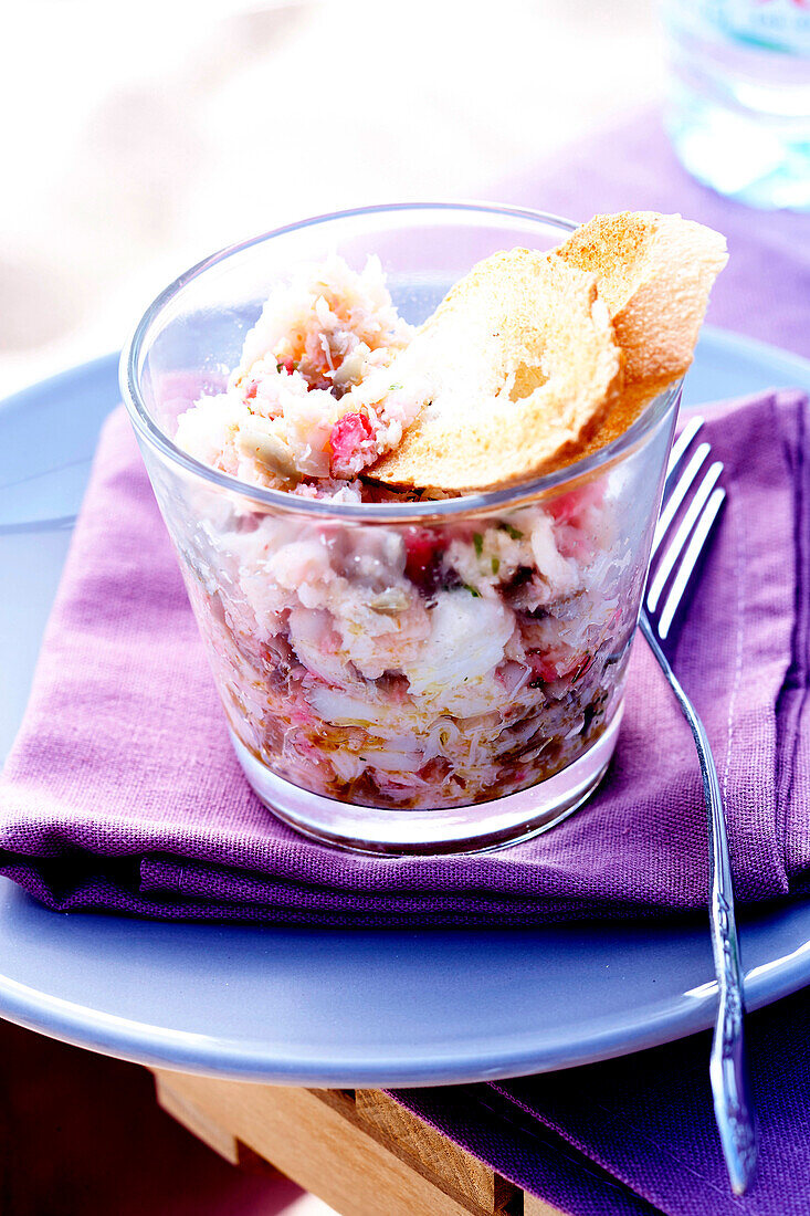 Homemade seafood rillettes and croutons