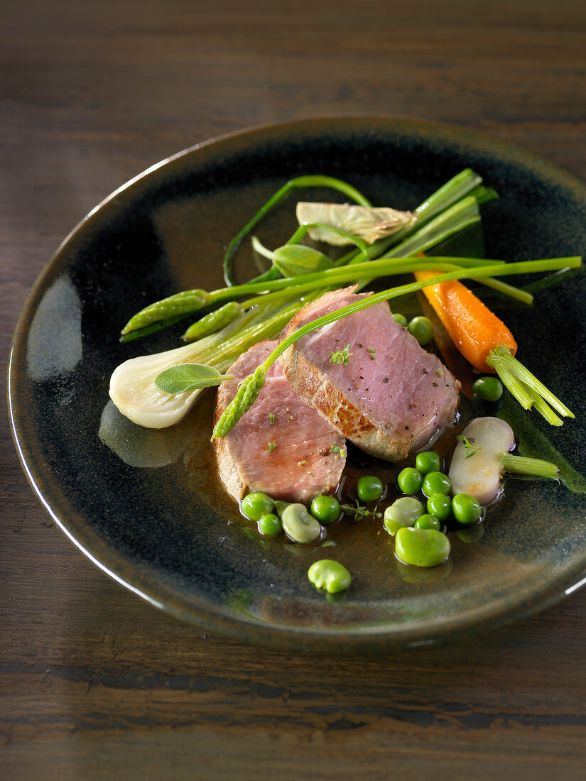Veal filet mignon with spring vegetables