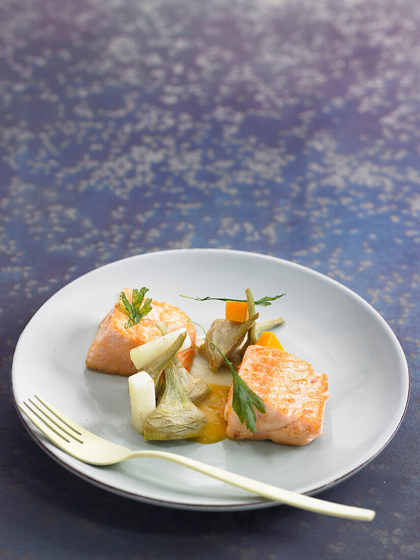 Salmon with artichokes and squash coulis