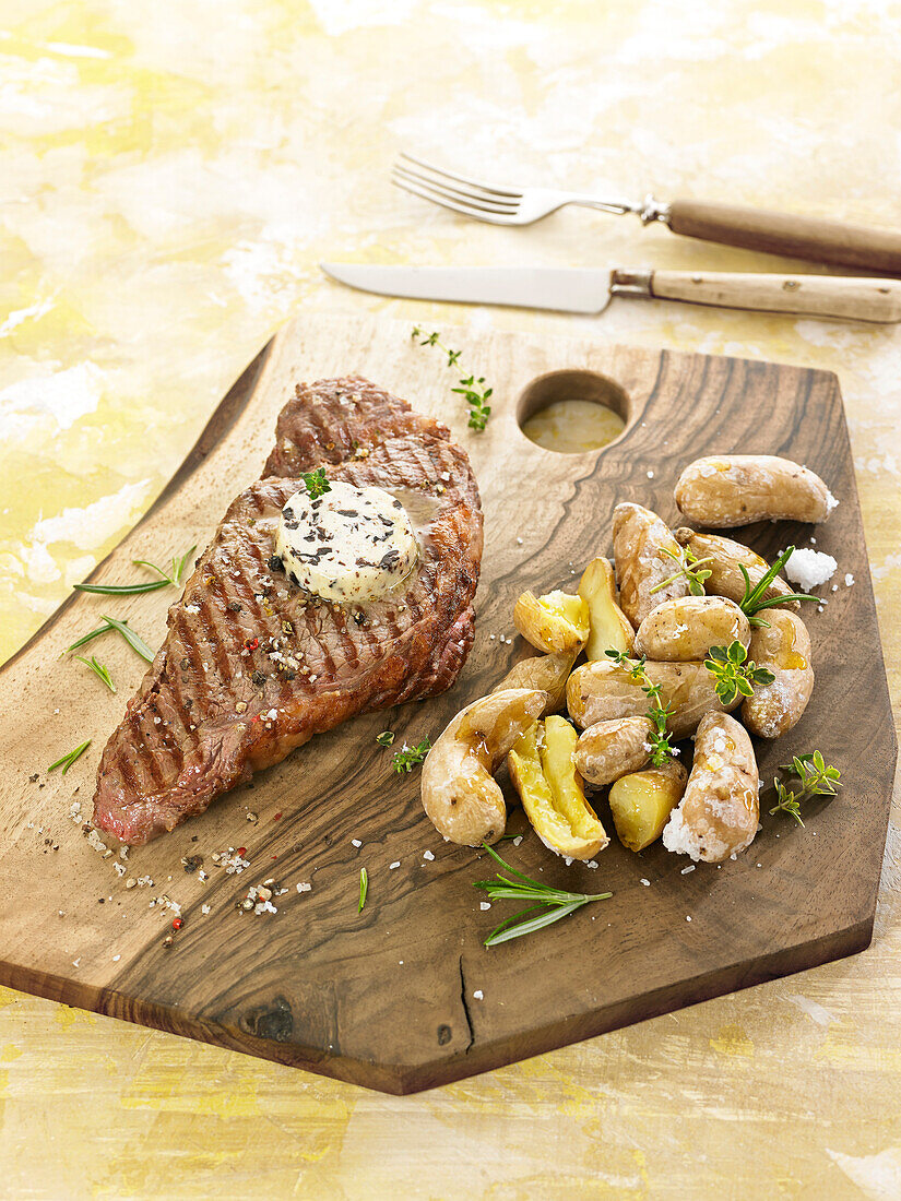 Grilled entrecote of beef, herb butter and salt potatoes