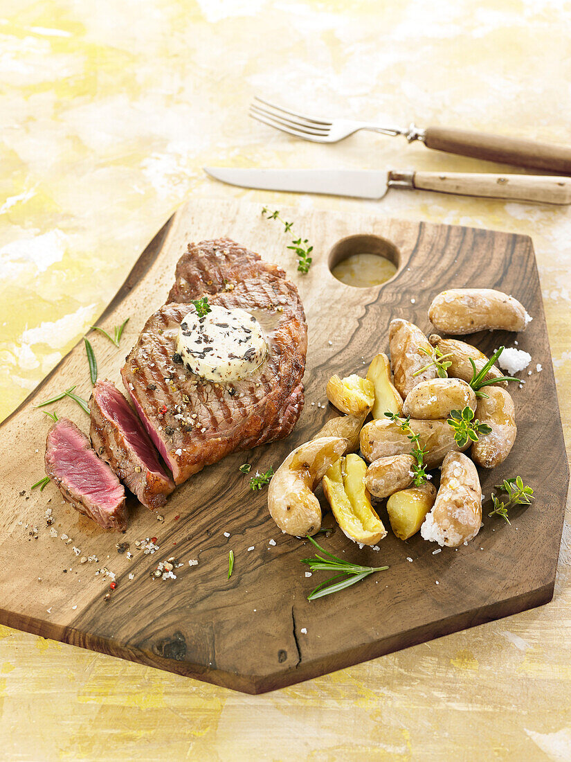 Grilled entrecote of beef, herb butter and salt potatoes