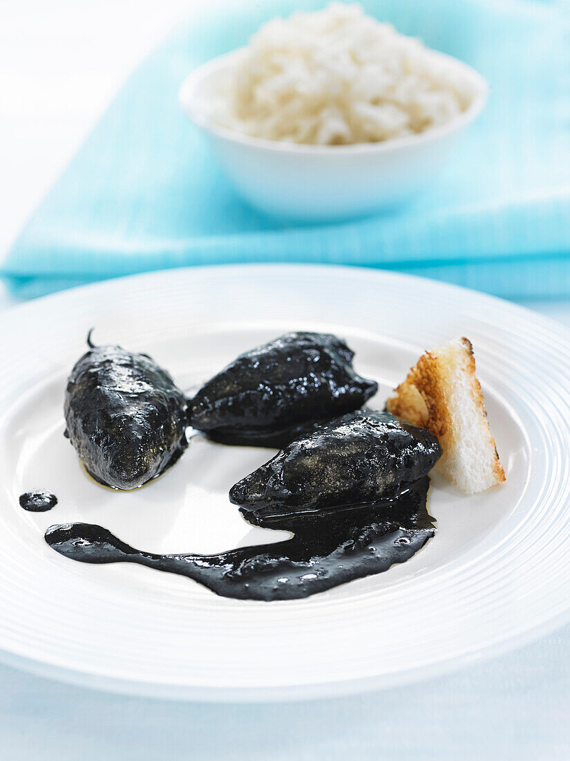 Stuffed squid ink chipirons