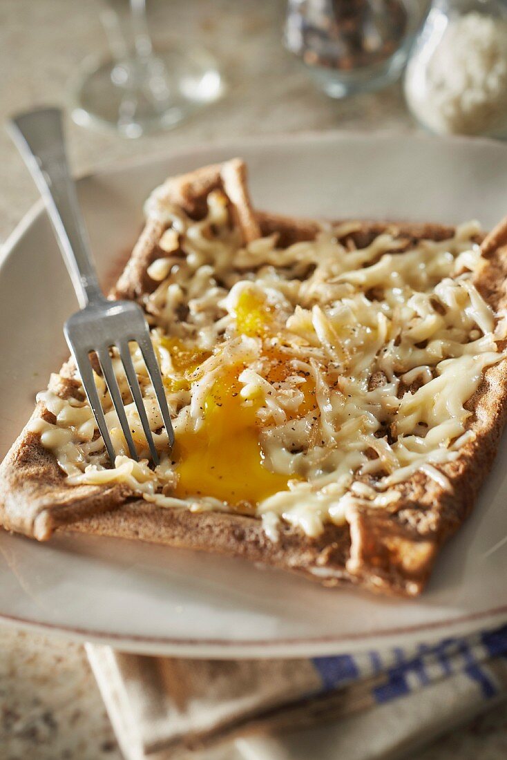 Petit Breton cheese,ham and egg buckwheat galette