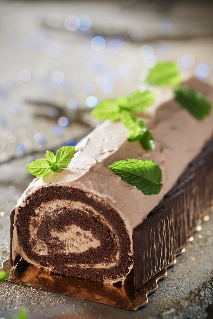 Chocolate and tea jelly log cake decorated with After Eights