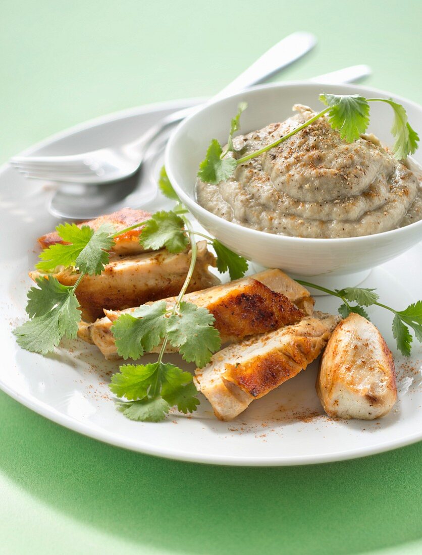 Spicy grilled chicken breast with eggplant puree