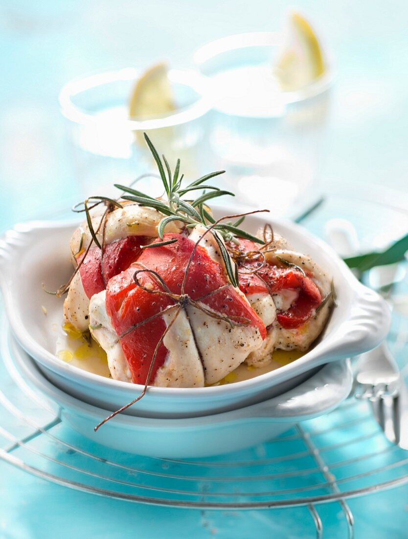 Rolled guinea-fowl fillets and red peppers with rosemary