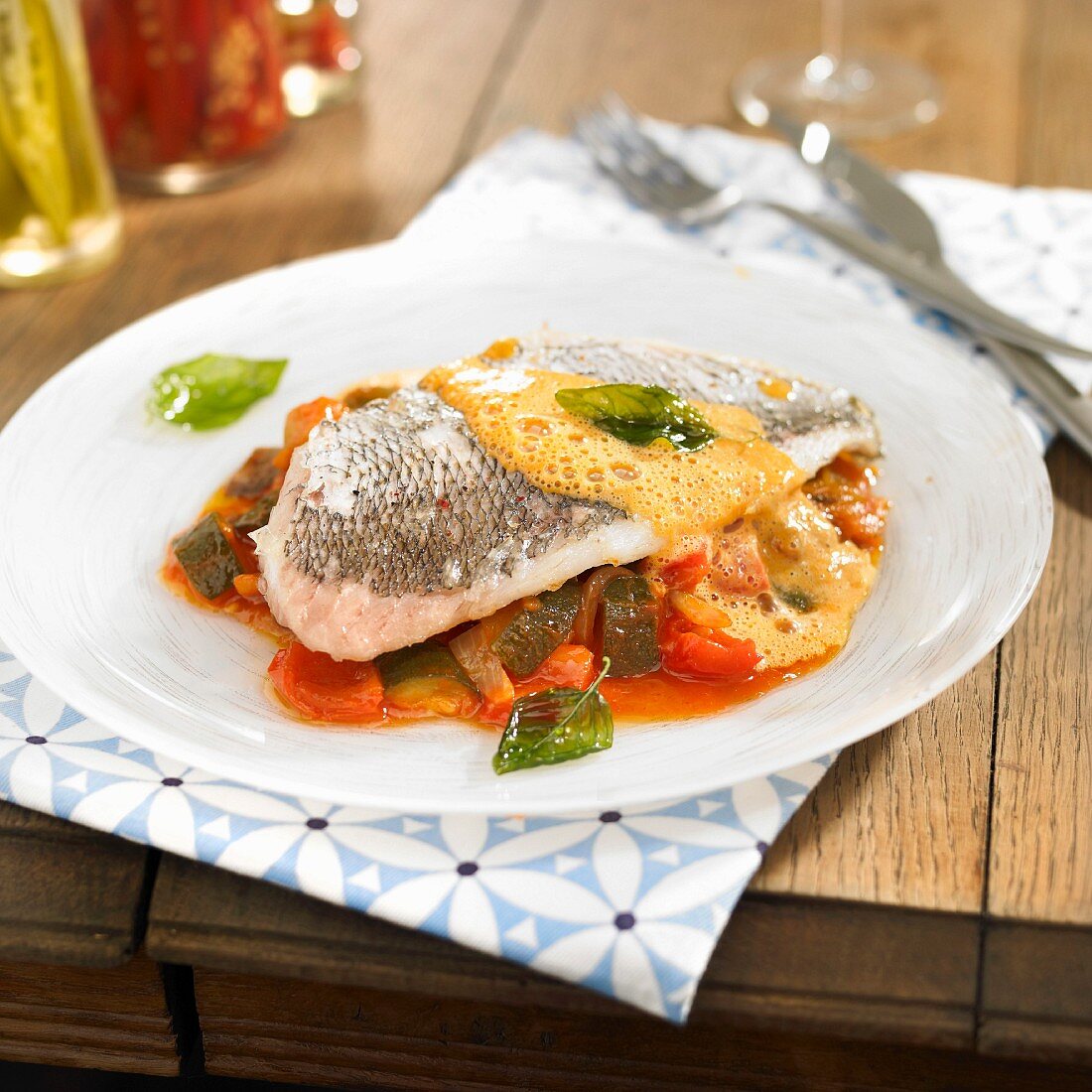 Steamed sea bream fillet on a bed of ratatouille