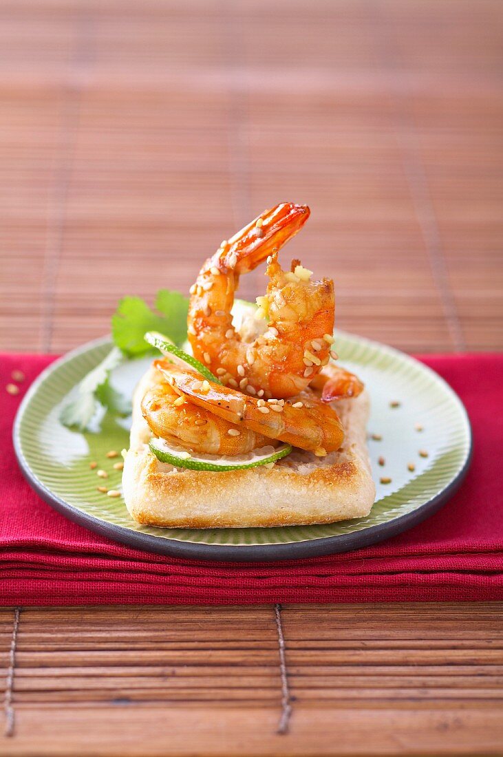 Marinated shrimp with sesame seeds on toast