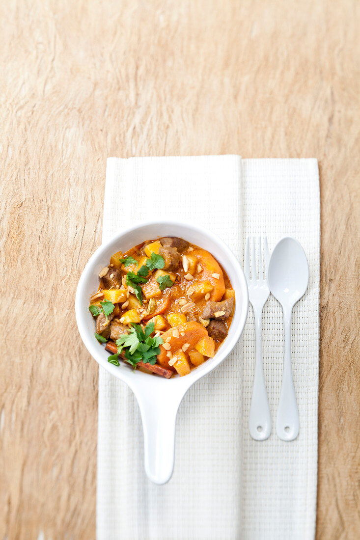 Duck with spicy sweet potatoes and peanuts