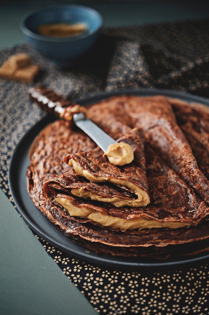 Cocoa Crêpes garnished with coffee cream