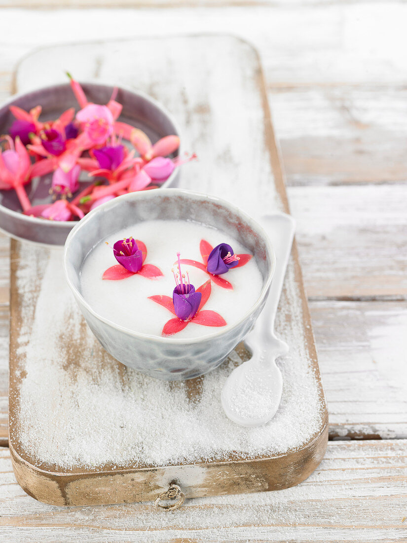 Yoghurt with Magellan fuchsia flowers