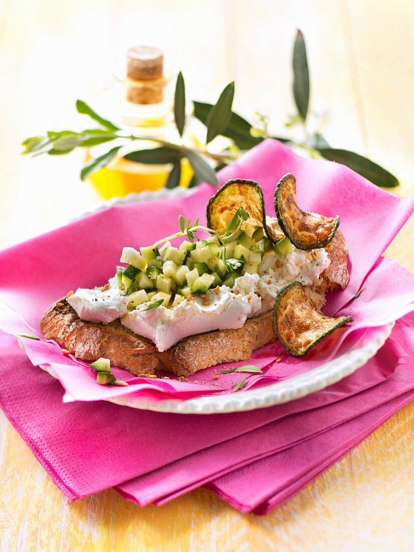 Bruschetta with Philadelphia cheese,sesame seeds,courgette tartare and crisps