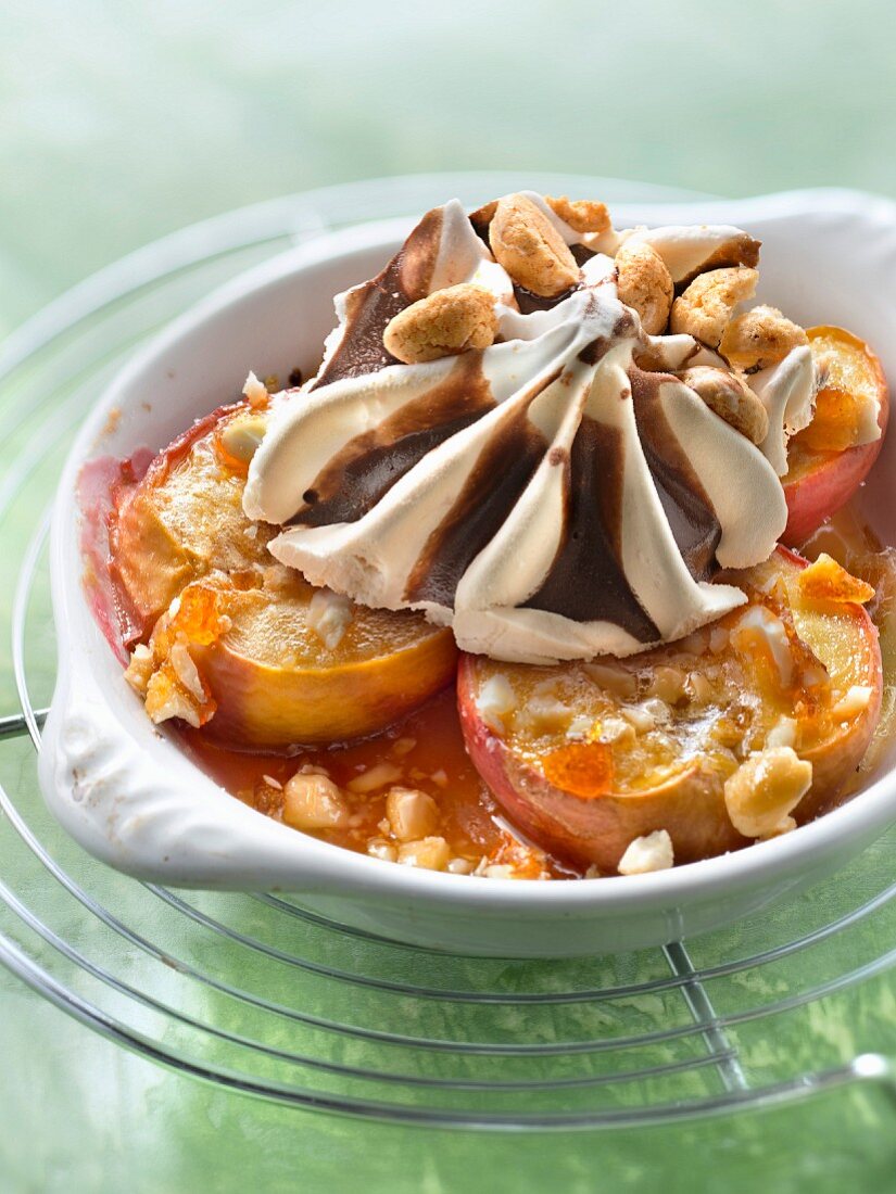 Roasted peaches with caramelized almonds and vanilla ice cream
