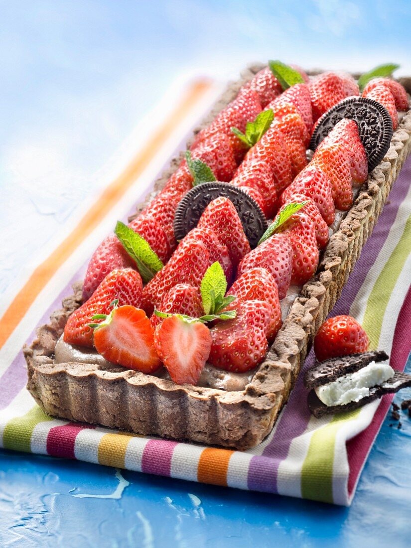 Oreo biscuit and strawberry tart