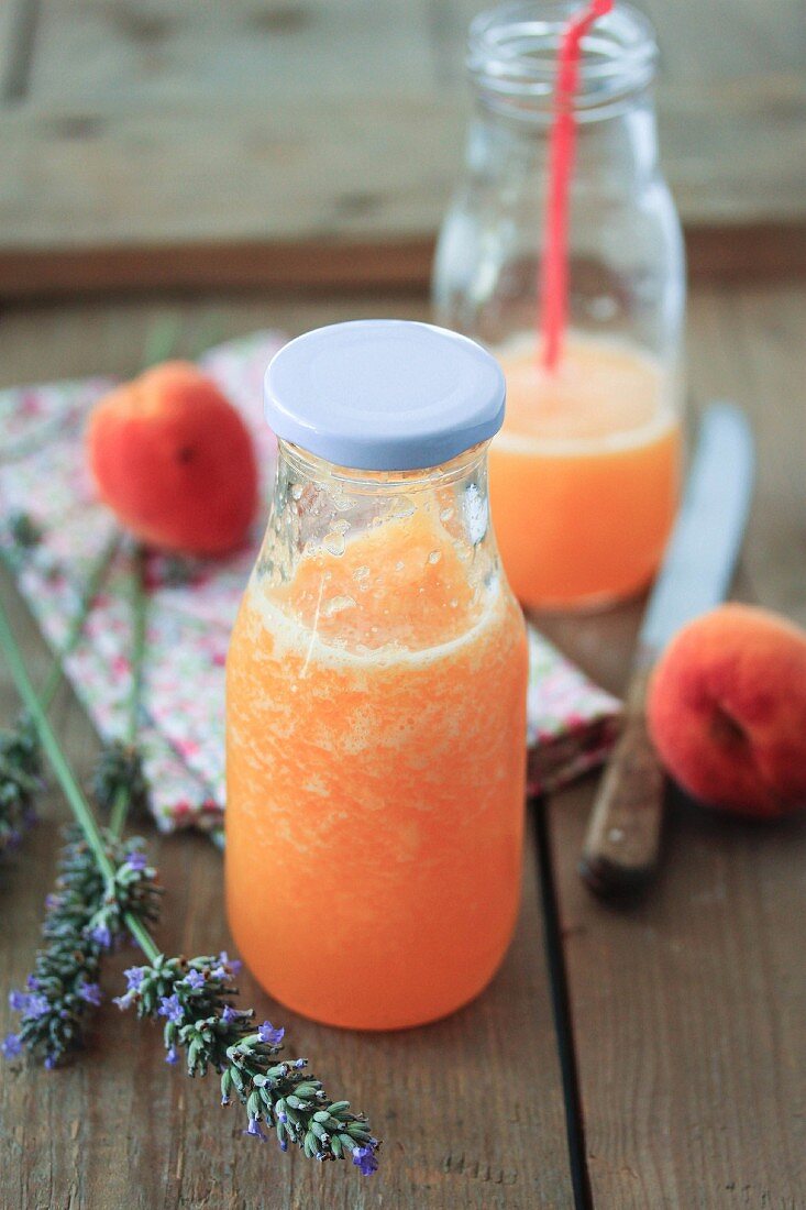 Bottles of homemade lavander-flavored apricot and nectarine juice