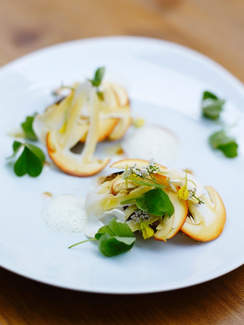 Warm orange mushroom,potato,mustard leaves and anchovy butter dish