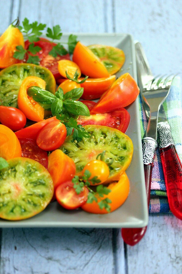 Mixed tomato salad with basil