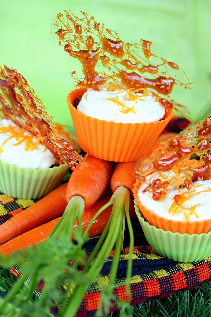 Carrot cupcake with fromage frais topping,sesame seed nougatine