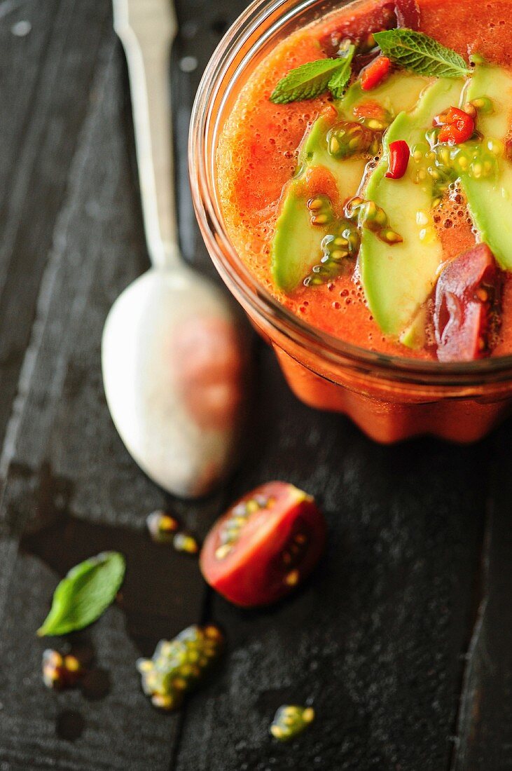 Watermelon and tomato gaspacho with thin slices of avocado