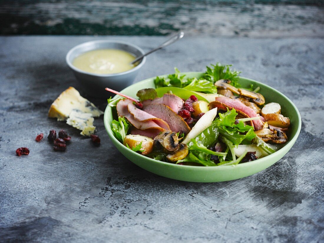 Roast beef and cranberry salad with blue cheese sauce